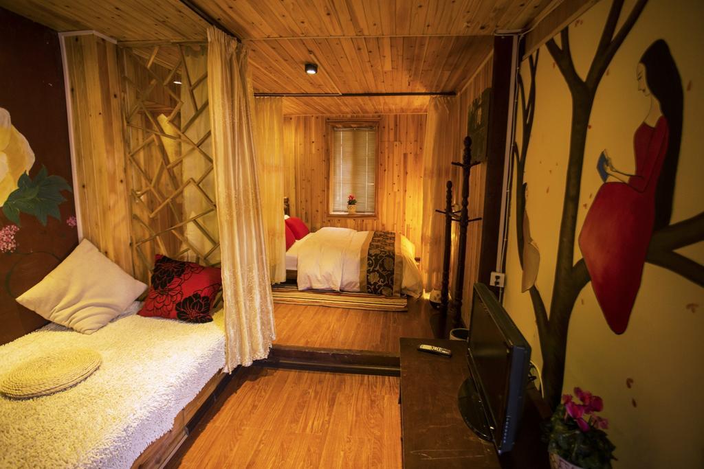 Secret Garden Hotel Лиджанг Стая снимка
