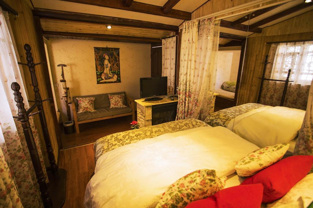 Secret Garden Hotel Лиджанг Стая снимка